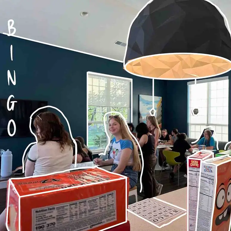 Residents playing bingo in the community lounge