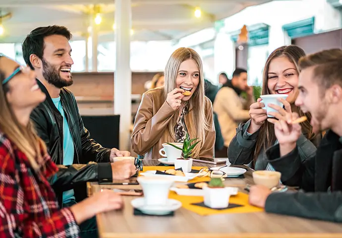 group of young adults at a restaurant